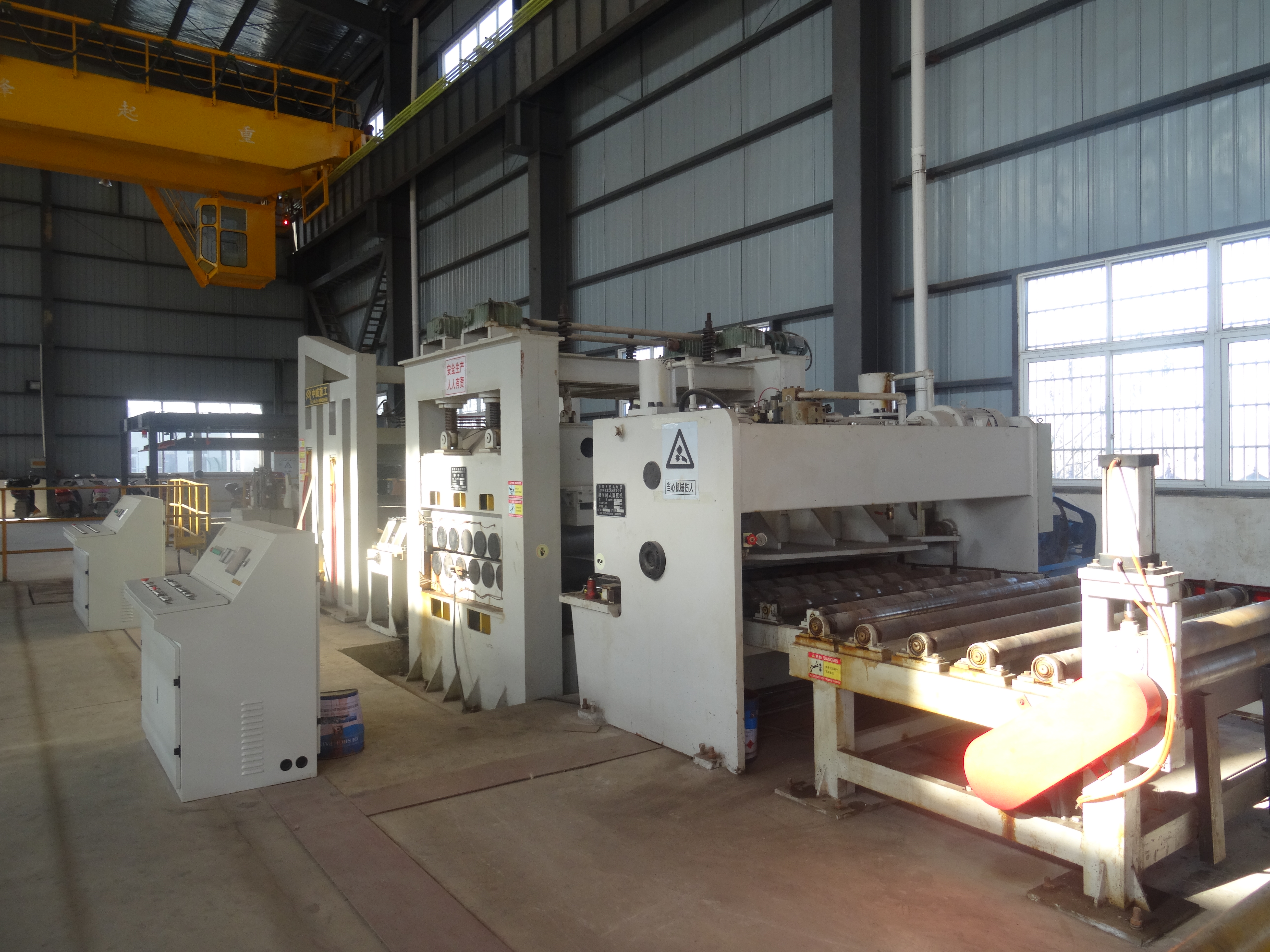 雄峰起重鋼卷開(kāi)平機(jī)設(shè)備